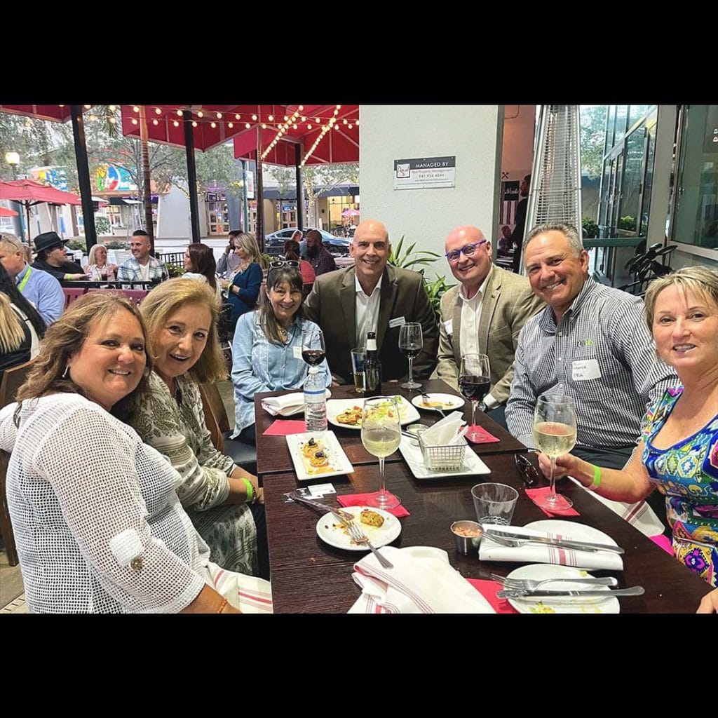 PRa's Managing Partner, Scott Kramer, and PRA Healthcare Partner, Kevin Broich, grab dinner with guests to celebrate new office