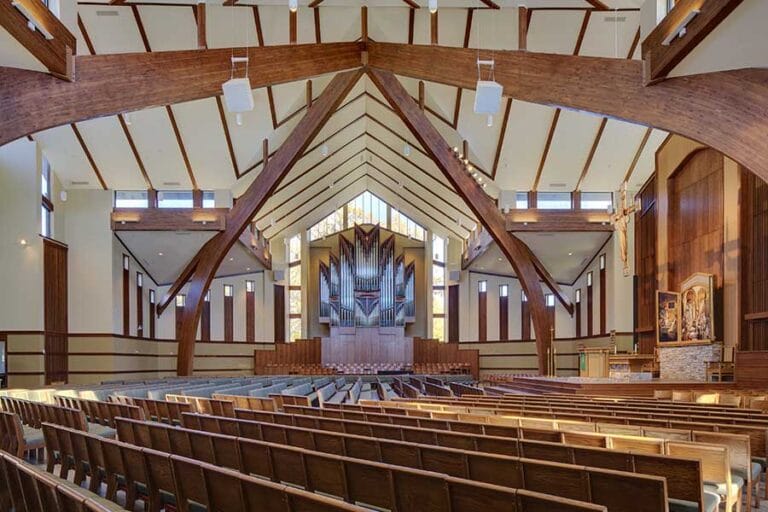 Martin Luther College Chapel Sanctuary, showcasing part of the pipe organ pipes in the transept