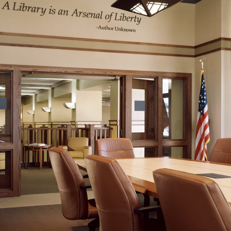 New Berlin Library Conference Room prominently located with reminders to the Board of their responsibility.