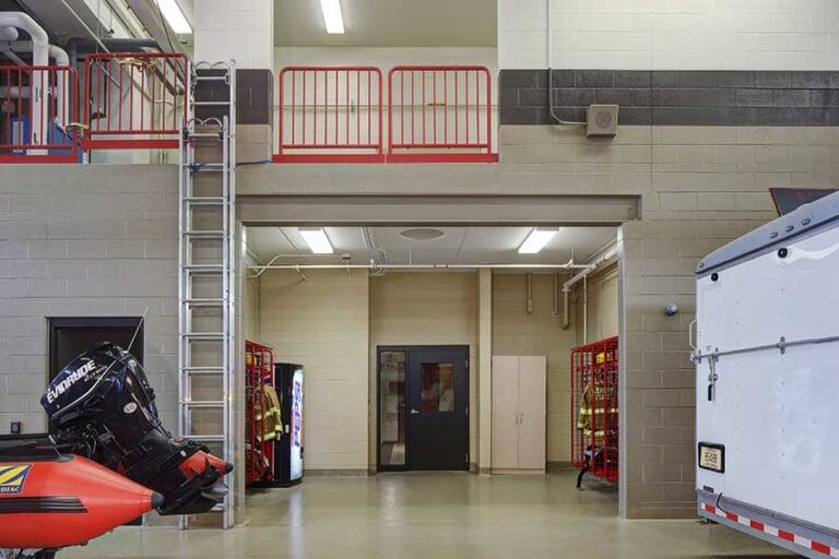 The alcove connects Turnout Gear storage room with the apparatus bay, and incorporates a variety of training opportunities for first responders.