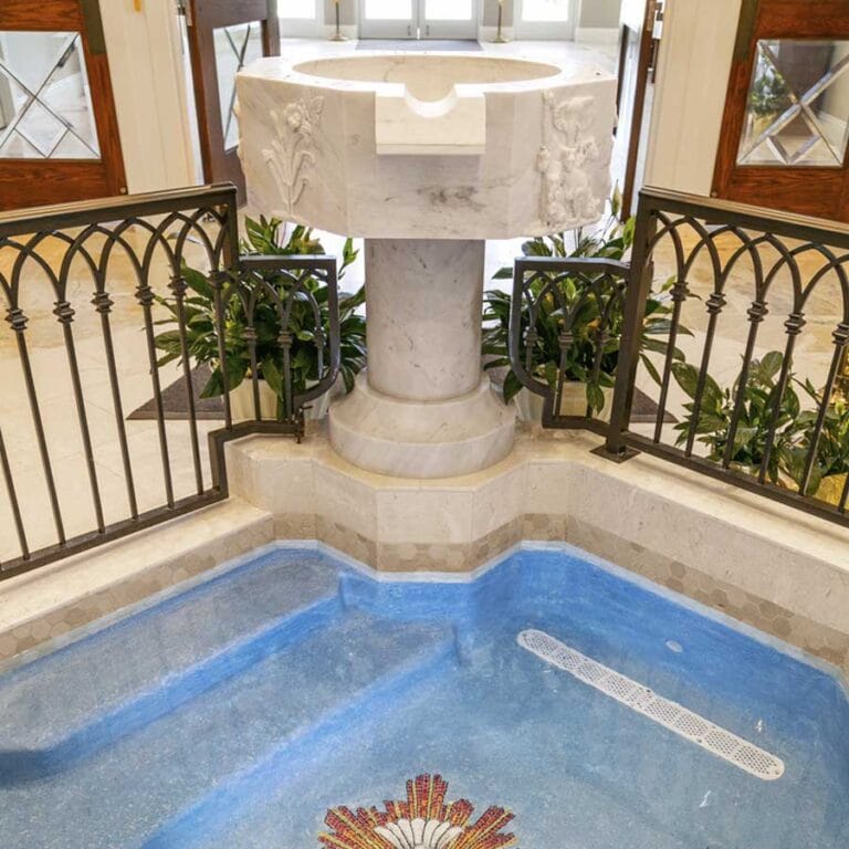 St. Catherine of Siena Catholic Church in Kissimmee Florida integrates a Baptismal Font so as to provide the full Sacrements of the Catholic Church